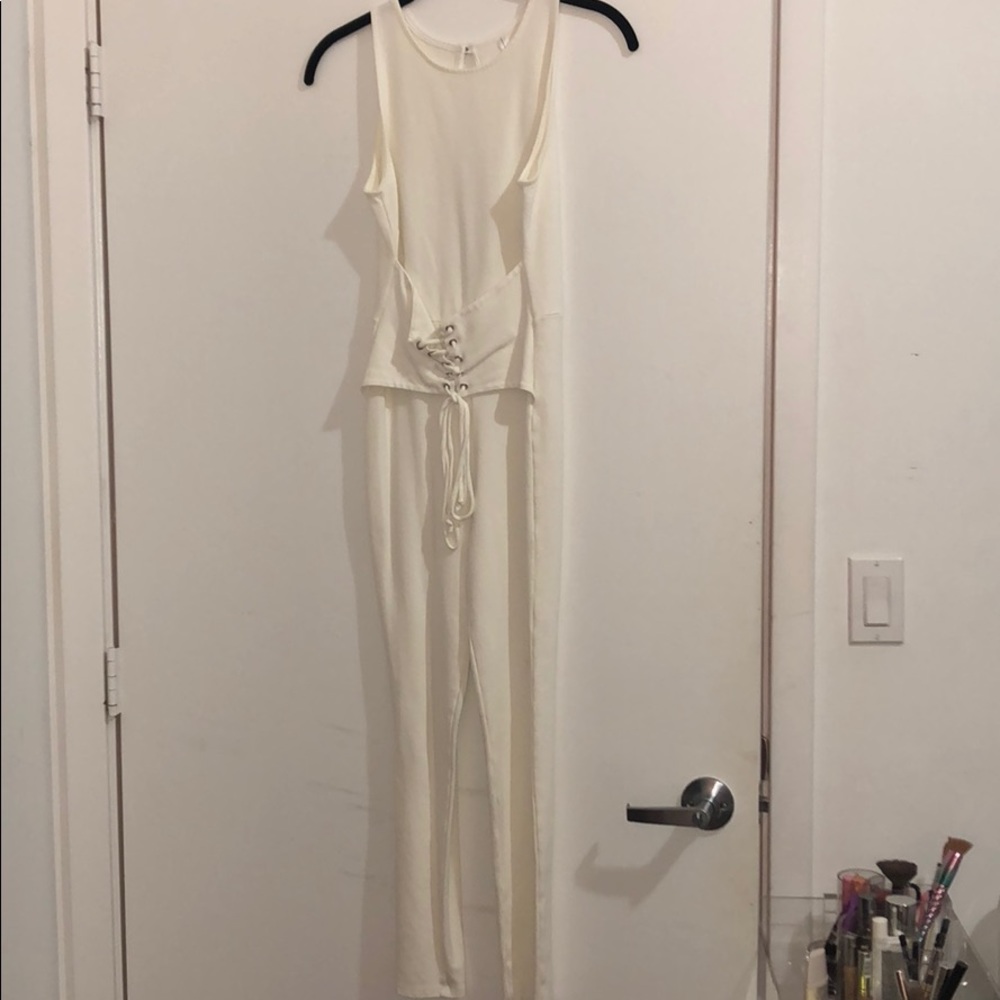 Off white colored jumper.